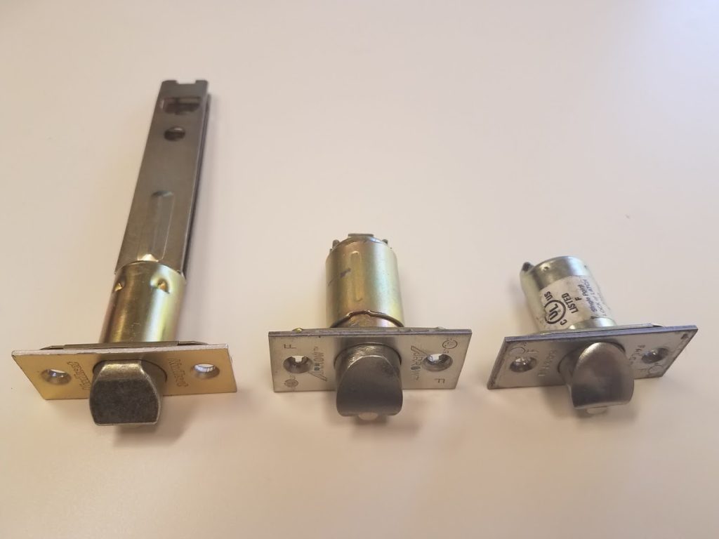 Commercial deadlatch and bolt hardware used in lock repairs and installations by Mile High Locksmith® in Denver.