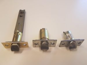 Commercial deadlatch and bolt hardware used in lock repairs and installations by Mile High Locksmith® in Denver.