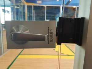 Commercial lever handle lock installed on a glass interior door by Mile High Locksmith® in Denver.