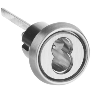 Rim mortise cylinder with tailpiece used for panic bar and exit device hardware on commercial doors.