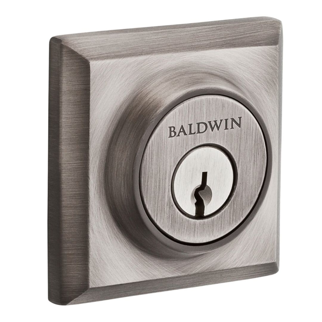 Baldwin square deadbolt lock cylinder—commonly rekeyed for key control in upscale residential doors.