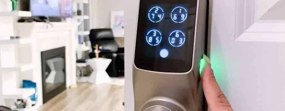 Smart door lock with a camera installed on a front door, providing keyless entry and remote access for homeowners in Denver, Colorado Springs, and Fort Collins.