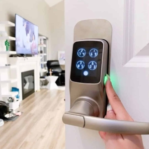 Smart door lock with a camera installed on a front door, providing keyless entry and remote access for homeowners in Denver, Colorado Springs, and Fort Collins.