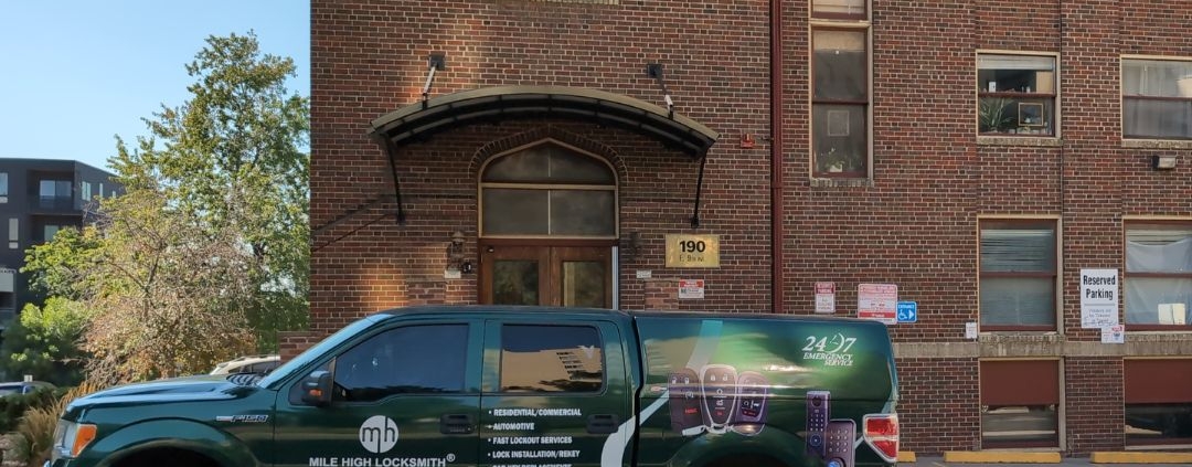 Mile High Locksmith® mobile service van parked outside 190 E 9th Ave in Denver, providing emergency, residential, and automotive locksmith services.