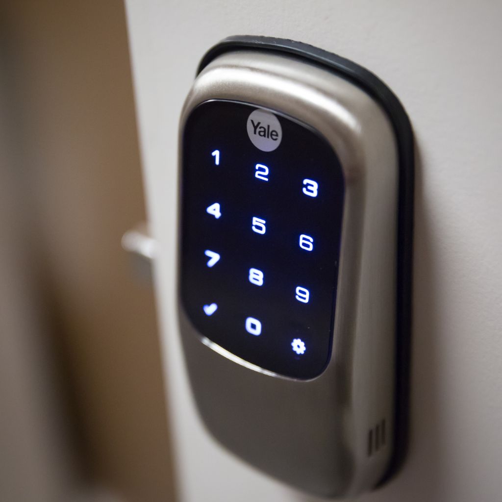 Door lock keypad installed on a door in Denver for keypad code troubleshooting and repair.